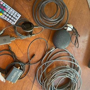 Electronic assortment: lights, cables, google home, Apple Watch band